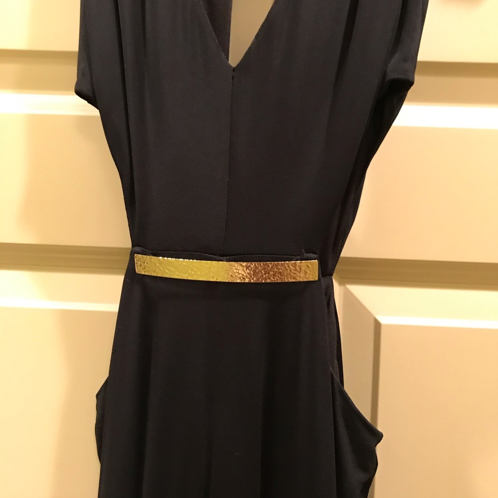 Dress black with side cut outs gold hardware